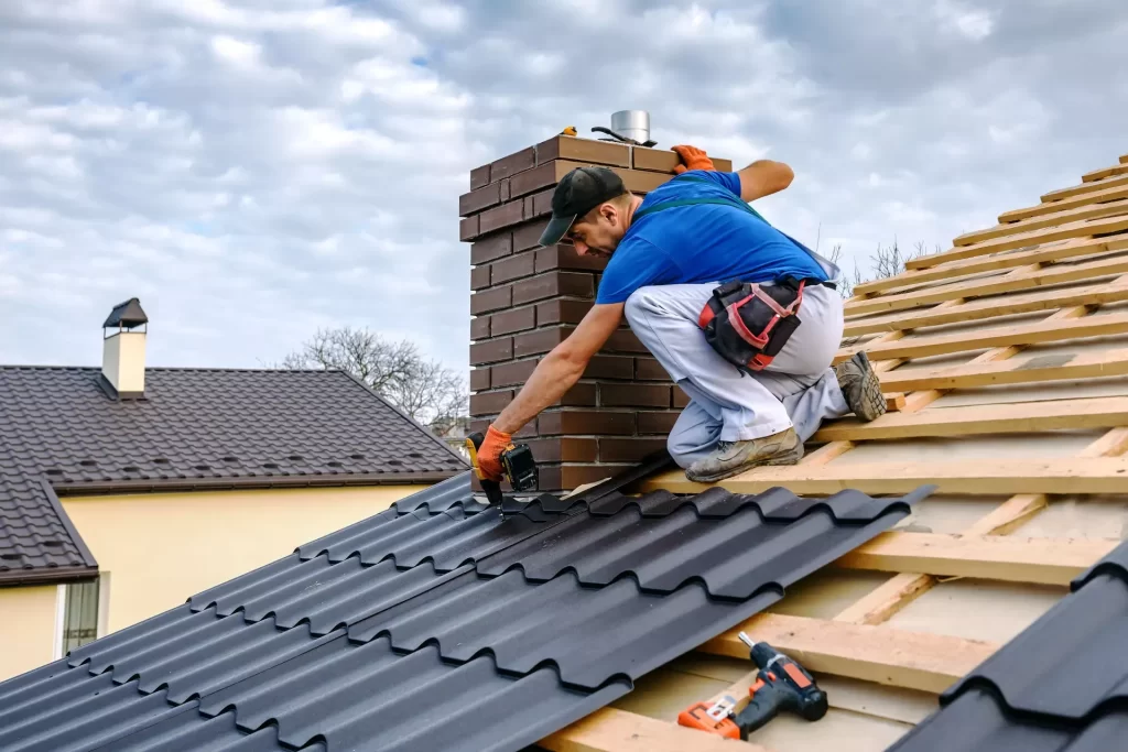 A Sunset Home Improvement Contractor working hard to get a rood job done.